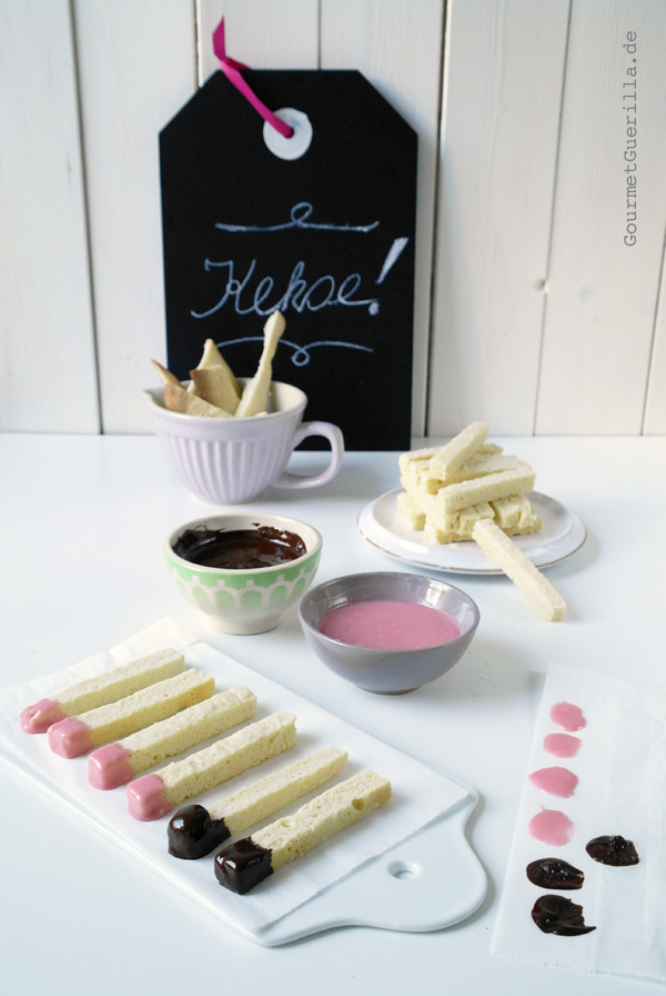  Matchstick biscuits are decorated with pink and brown casts. 